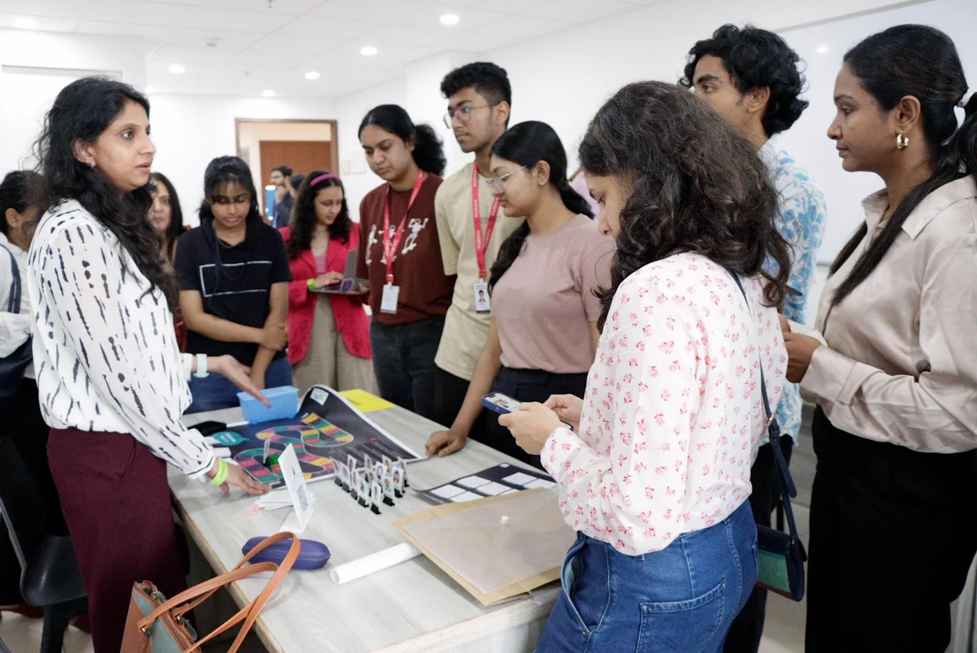 Women creators and participants exchanging ideas during a workshop.